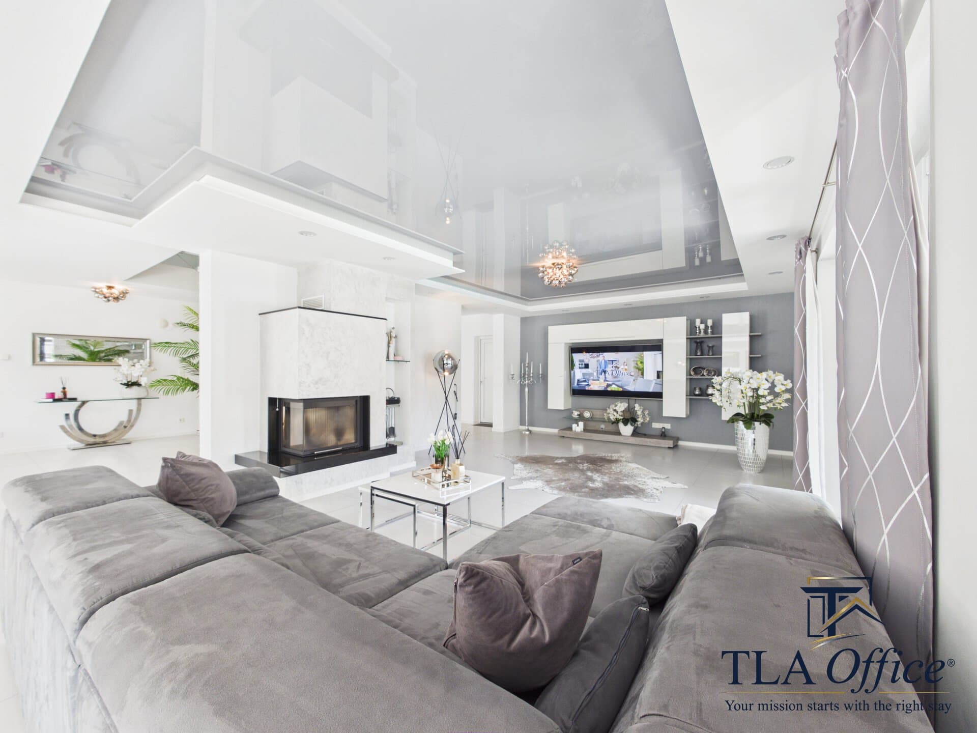 CAM01139G0-PR0080-STILL031 Living room with sectional sofa and fireplace - Luxury TLA Residence Siegelbach