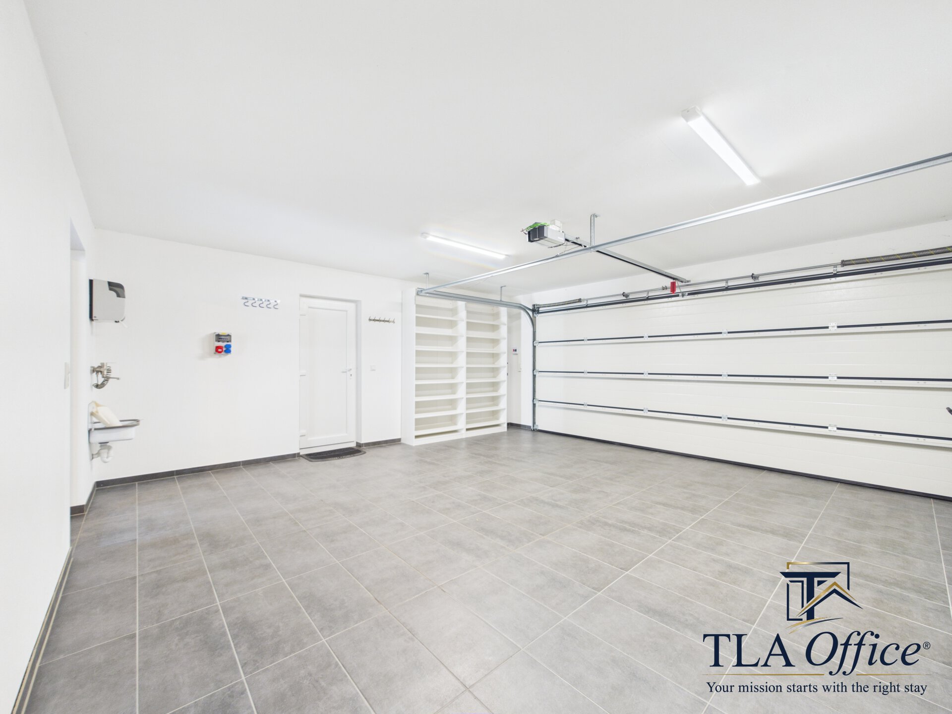 CAM01139G0-PR0080-STILL043 Spacious garage with storage shelving - Luxury TLA Residence Siegelbach