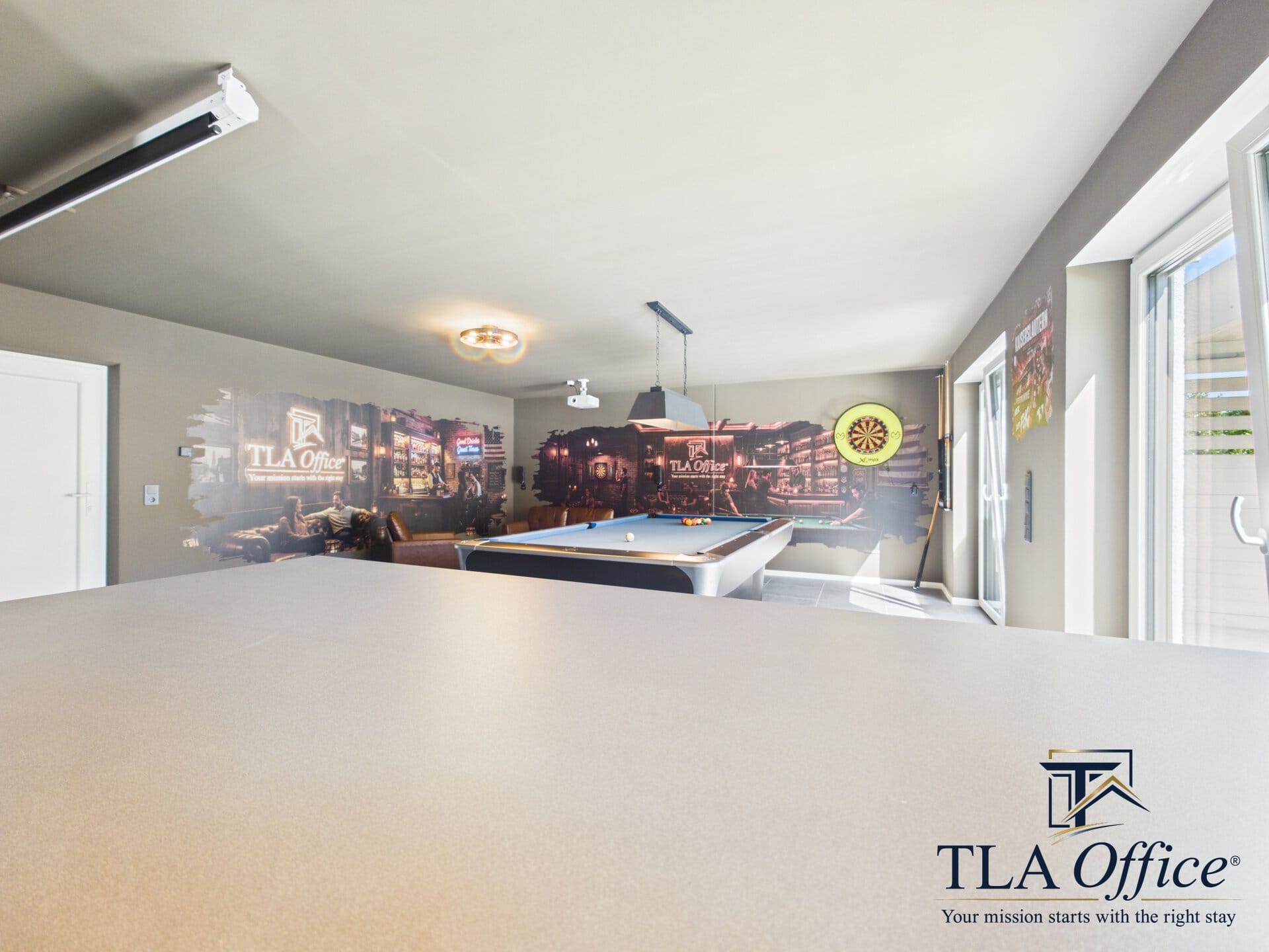 CAM01139G0-PR0080-STILL058 Game room with pool table, bar mural and dartboard - Luxury TLA Residence Siegelbach