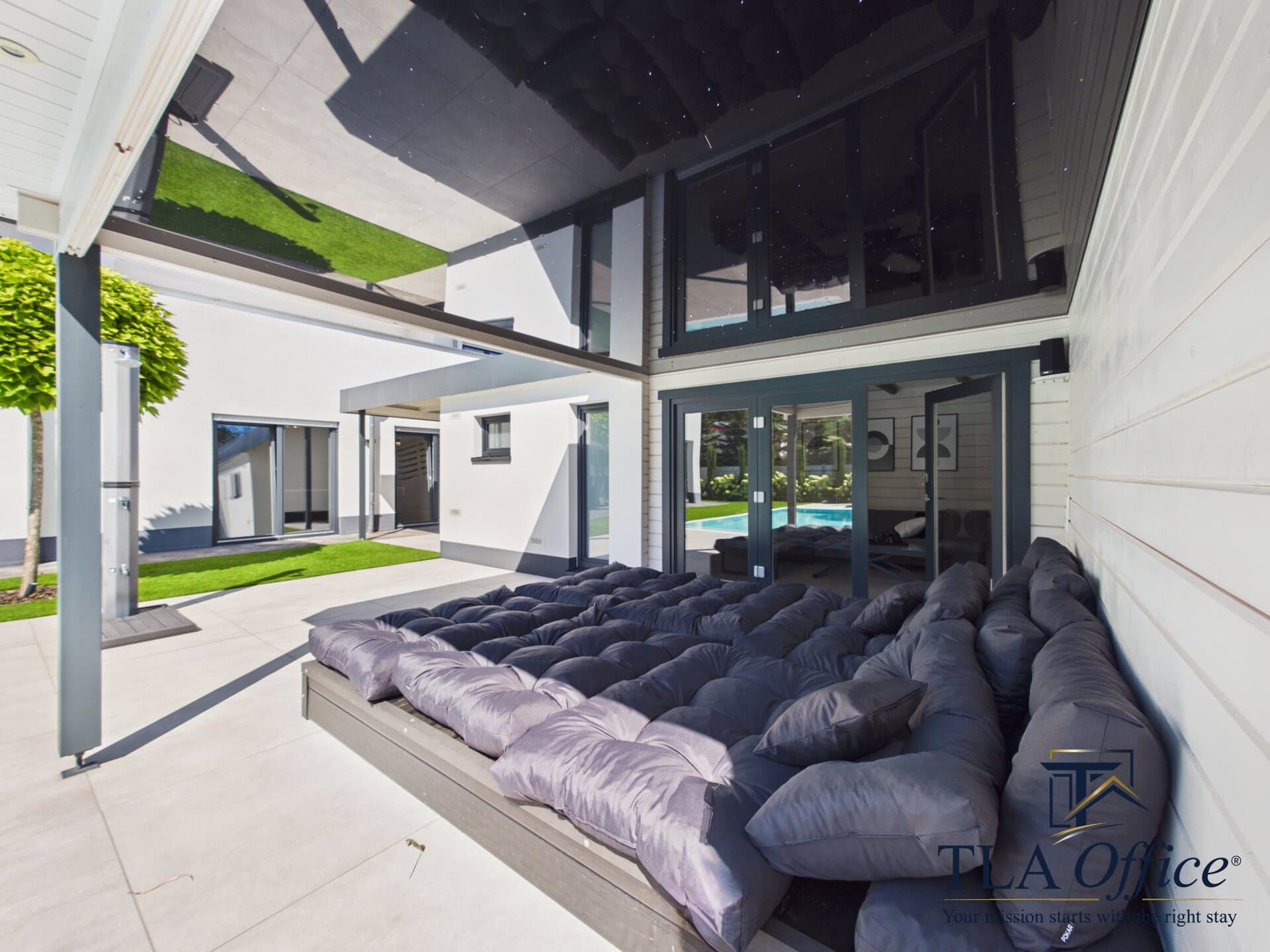 CAM01139G0-PR0080-STILL070 Outdoor lounge daybed with oversized cushions on the patio - Luxury TLA Residence Siegelbach