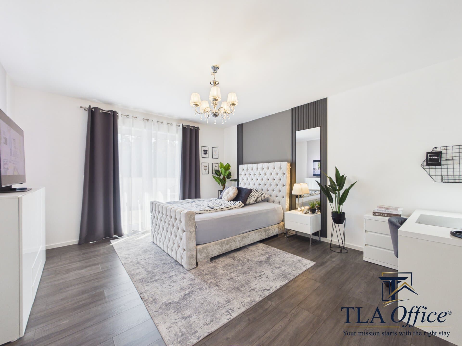 CAM01139G0-PR0080-STILL088 Bedroom with tufted headboard and chandelier - Luxury TLA Residence Siegelbach
